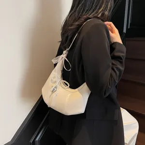 Women white crescent shoulder bag stylish leather hobo handbag with lace bow and pearl charm.