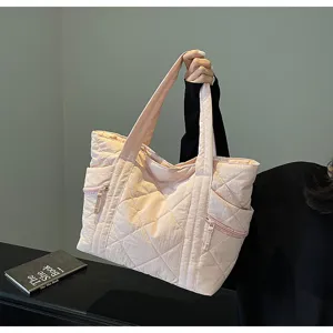 Fashionable pink quilted tote bag for women, large capacity casual single shoulder bag with chic design.