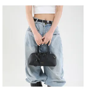 Black cylindrical boston handbag minimalist chic PU leather shoulder bag daily fashion style.