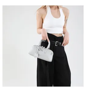 Stylish silver boston handbag for women, versatile shoulder bag with small tag design.