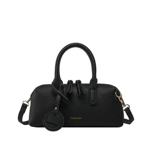 Black PU leather Boston handbag for women, chic top handle shoulder crossbody bag with elegant charm.