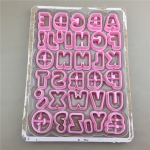 Plastic alphabet letter cookie cutters and fondant molds set for baking and clay crafts.