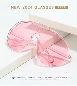 Vista dettaglio occhiali da sole rosa grande montatura, design sportivo di tendenza.