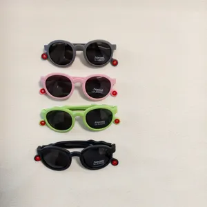 Kids polarized sunglasses in four candy colors, UV protection eyewear for summer outdoor fun.