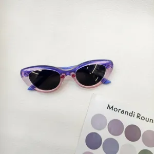 Kids vintage cat-eye sunglasses with gradient transparent frame for stylish boys and girls.