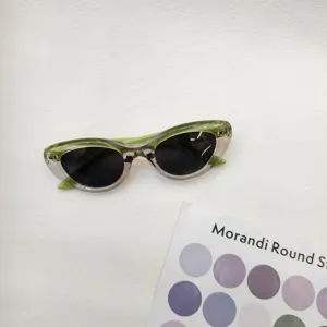 Kids vintage cat-eye sunglasses with gradient transparent frames for stylish daily wear.
