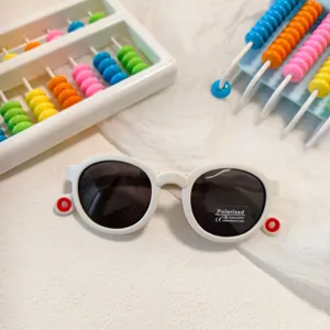 Cute baby polarized sunglasses with candy color frames, ideal for summer sun protection.