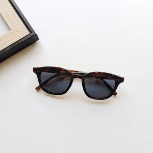 Children tortoise shell sunglasses with UV400 protection and rivet decor for kids.