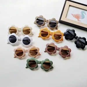 Cute kids flower sunglasses for boys and girls, trendy toddler sun protection eyewear details.