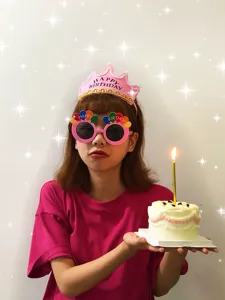 Fun pink birthday party glasses and crown set with balloons and happy birthday text design.
