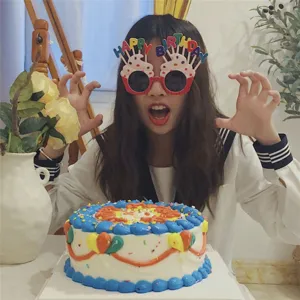Fun birthday party novelty glasses with colorful cake design, perfect for celebration photos.