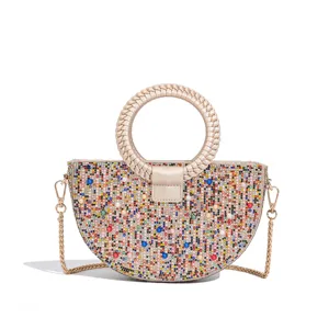 Elegant semi-circular rhinestone evening bag with beaded pearl decoration and chain strap.