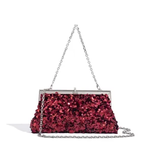 Detailed view of red sequin evening clutch bag with sparkling crystals and silver chain.