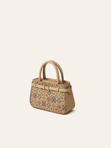 Cork folk print handbag detail view, showing ethnic pattern, leather handles and buckle.