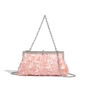 Elegant pink sequin evening clutch bag with silver chain strap for party and prom.