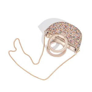 Detailed view of luxury rhinestone evening bag with chain strap and beaded round handle.