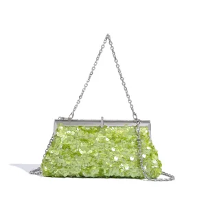 Detailed close-up of the elegant light green sequined evening clutch with shiny metallic chain.