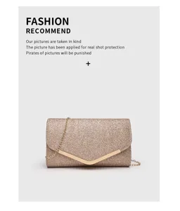 Glitter evening bag detail showing sparkling finish and gold chain strap elegant design.