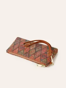 Bohemian geometric print long wallet with wrist strap and gold zipper detail view.