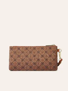 Detailed view of women's retro geometric print clutch wallet with top zipper and wrist strap.