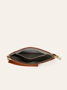 Detailed view of women's brown PU leather clutch purse with zipper and patterned interior.