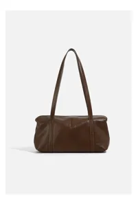 Detailed view of a retro brown leather underarm shoulder bag featuring a structured design and sleek strap.