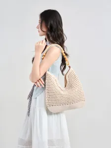 Beige crochet cotton tote bag for women, stylish beach vacation shoulder bag with wooden beads.