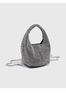 Rhinestone bucket bag detail, sparkling crystal mesh surface, exquisite metal chain strap.