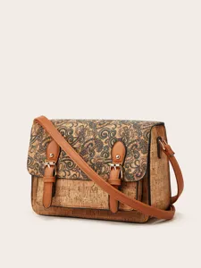 Retro schoudertas van kurk met bruine lederen riemen en een prachtig vintage paisleymotief.