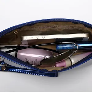 Blue patent leather shell cosmetic bag, stylish candy color clutch with wrist strap.