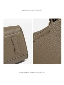 Detailed view of premium taupe leather handbag showing fine litchi grain and neat stitching texture.