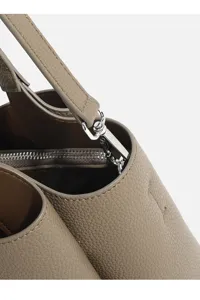 Detailed close-up view of the women taupe pebbled leather shoulder bag with silver hardware.