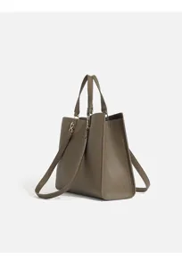 Detail view of a stylish women pebbled leather tote shoulder bag in taupe with dual handles.