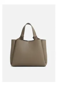 Detail shot of a taupe leather tote bag showcasing fine pebble texture, double top handles.