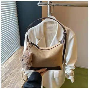 Brown suede women shoulder bag underarm bag with cute plush dog pendant for autumn winter