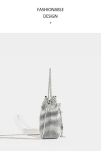 Sparkling rhinestone bucket bag detail, luxury evening handbag with silver chain strap.