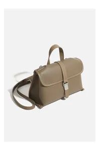 Stylish women's pebbled leather top handle crossbody bag, elegant daily commute purse.