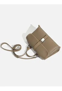 Chic women's crossbody shoulder bag with stylish metal buckle and strap for daily commute.