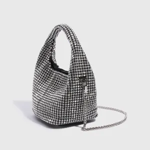 Sparkling rhinestone bucket bag for women, luxury crystal handbag with silver chain strap.