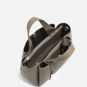 Stylish women's tote shoulder bag in taupe genuine leather with multi-compartment design.