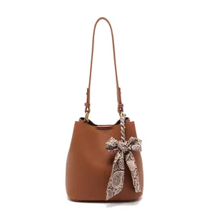 Brown leather bucket bag with scarf bow, stylish shoulder handbag for women main view.
