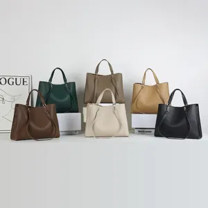 Women's multi-color faux leather tote bag large capacity casual shoulder handbag.