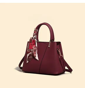 Wine red women handbag with stylish scarf detail, large capacity shoulder bag for daily use.