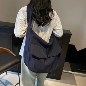 Large capacity minimalist crossbody tote bag, casual chic shoulder bag for daily student commuting.