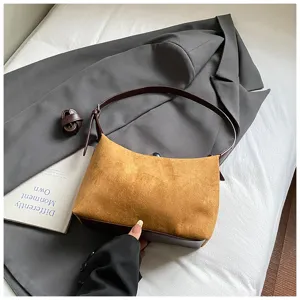 Brown suede shoulder bag detail, stylish daily hobo bag with dark brown leather strap.