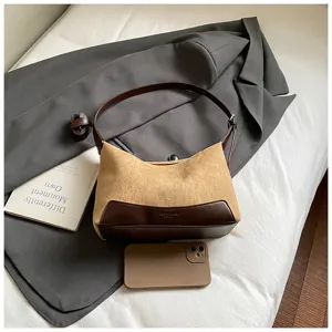 Stylish suede patchwork underarm shoulder bag for women, elegant daily hobo handbag design.