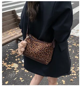 Women leopard print shoulder bag stylish underarm crossbody bag with cute plush pendant