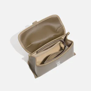 Stylish women's crossbody shoulder bag, premium leather commuter handbag with open interior.