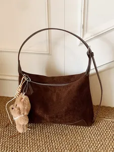 Brown suede underarm shoulder bag with cute plush puppy keychain for women daily use