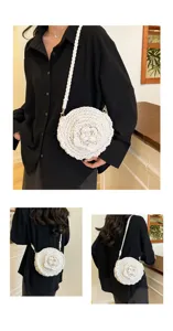 Detail view of the white woven crossbody bag featuring a 3D handmade crochet flower design.
